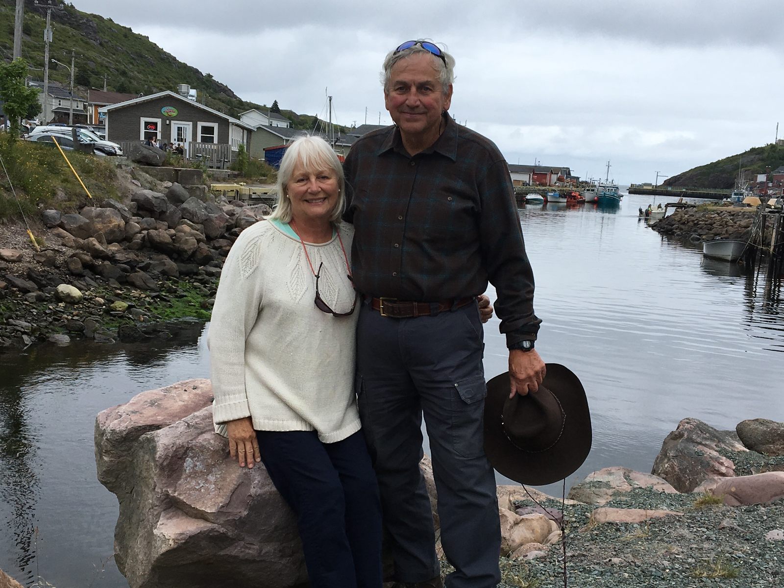 Tom and Cindy McKenzie beside a Newfoundland fishing harbour
